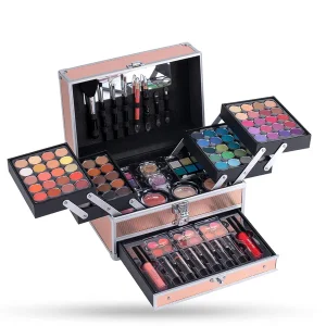 Open modern makeup case with trays of eyeshadow colours, lipsticks and brushes, an example of shop-bought make-up